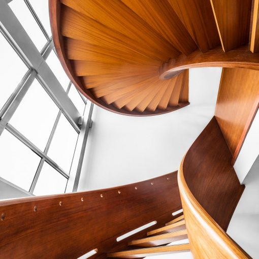 architectural photography of brown wooden stairs