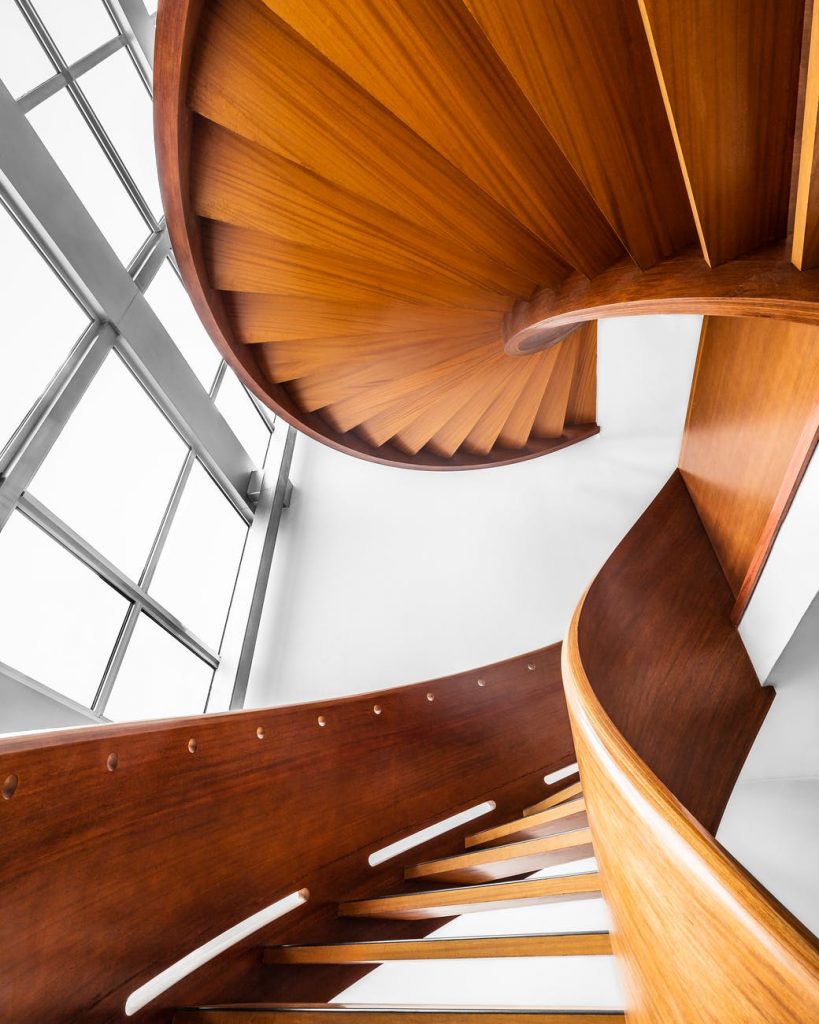 architectural photography of brown wooden stairs